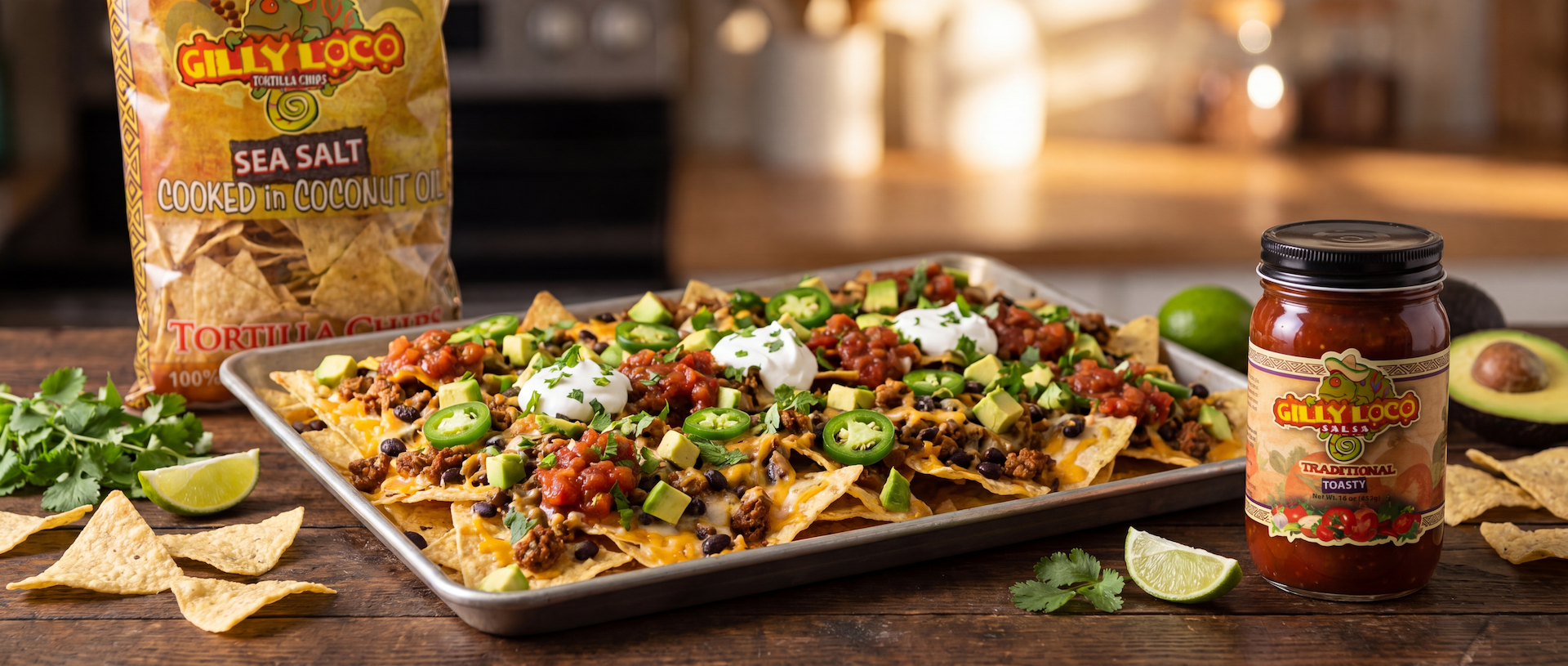 New Mexico-style loaded nachos made with Gilly Loco Seed Oil Free Tortilla Chips, salsa, melted cheese, jalapeños, and fresh toppings.