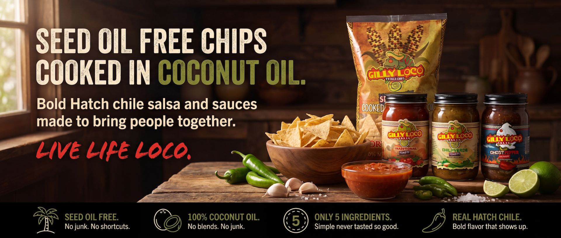 Seed Oil Free Gilly Loco tortilla chips cooked in 100% coconut oil with Hatch chile salsa and sauces displayed on a rustic kitchen table with bold branding and fresh ingredients.