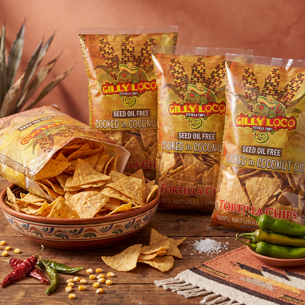 Closeup of crispy seed oil free yellow corn tortilla chips with sea salt and coconut oil crunch